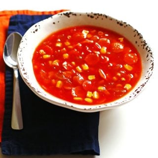 This recipe for Crockpot Tomato Vegetable Soup can be prepared in less than thirty minutes and cooks all day for a delicious and healthy dinner.