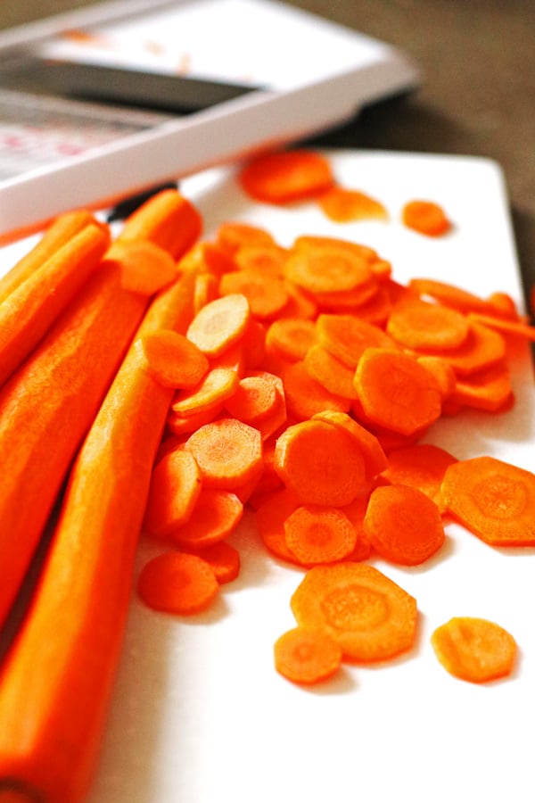 Sliced carrots on a cutting board