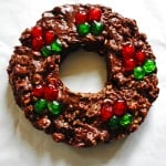 Fudge shaped into a Christmas wreath with red and green candies on top
