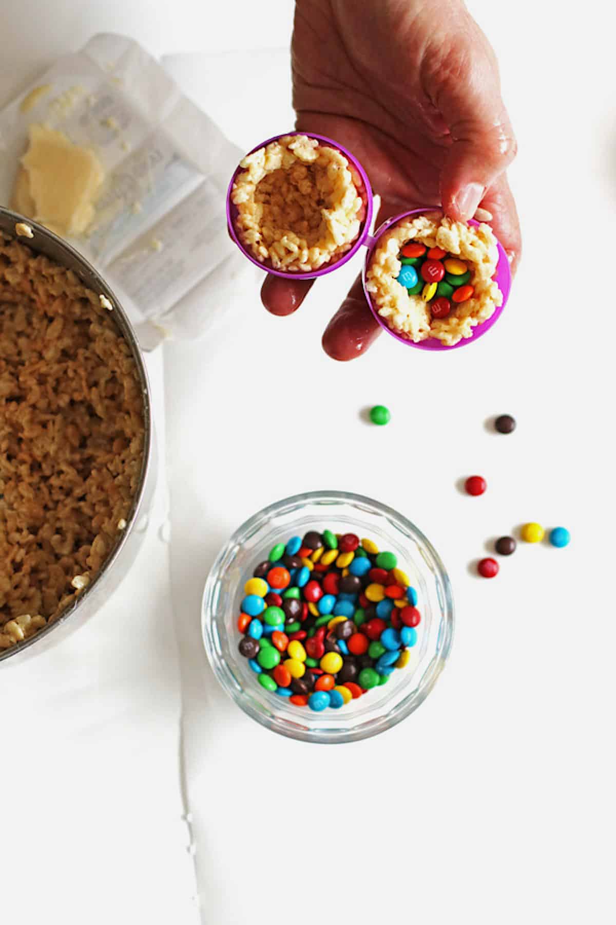 Filling eggs with M&M candy