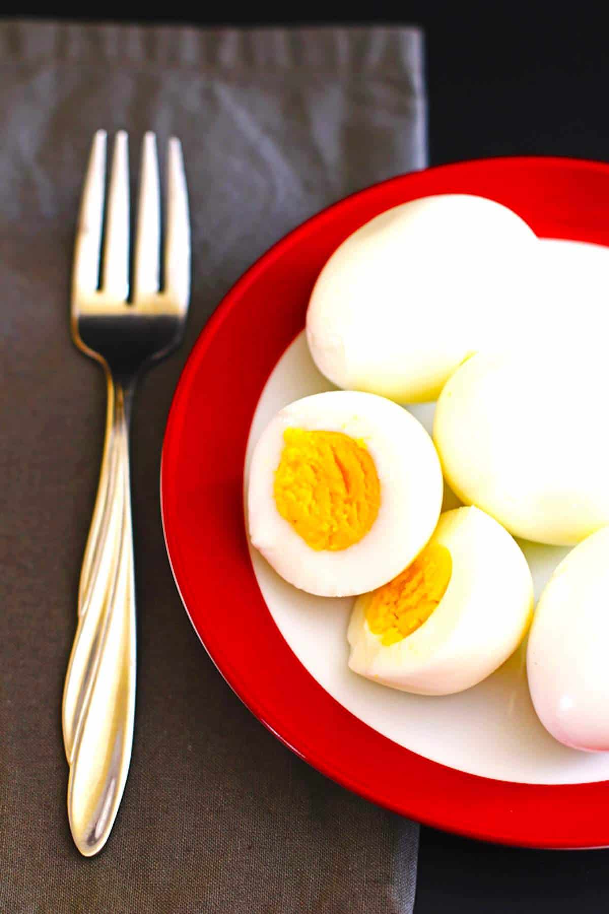 Sliced hardboiled eggs for making easy egg salad.