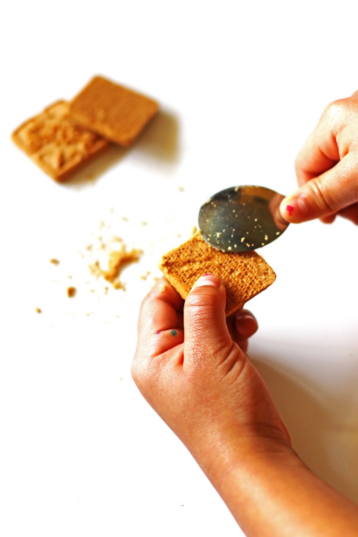 Making the cookies to look like tombstones by scraping the edges with a spoon