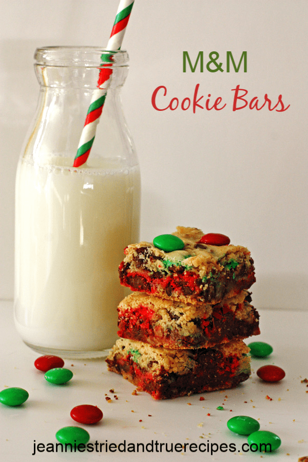 Festive M&M Cookie Bars are a delicious and easy recipe to make for the holidays or for any day of the year! #holidaybaking #christmascookies #dessert #easydessertrecipe #cookiebars