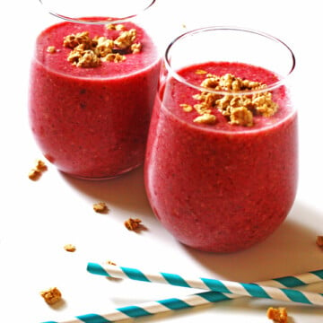 Two glasses of Berry Granola Smoothie.