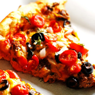 This Taco Pizza recipe puts two favorites together...tacos and pizza.