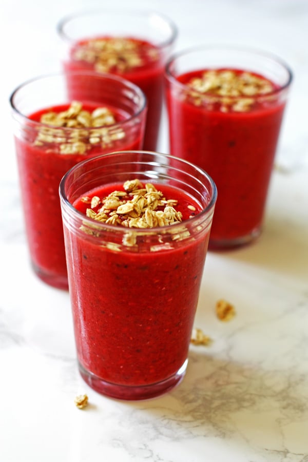 Four Mixed Fruit and Granola Smoothie topped with extra granola.