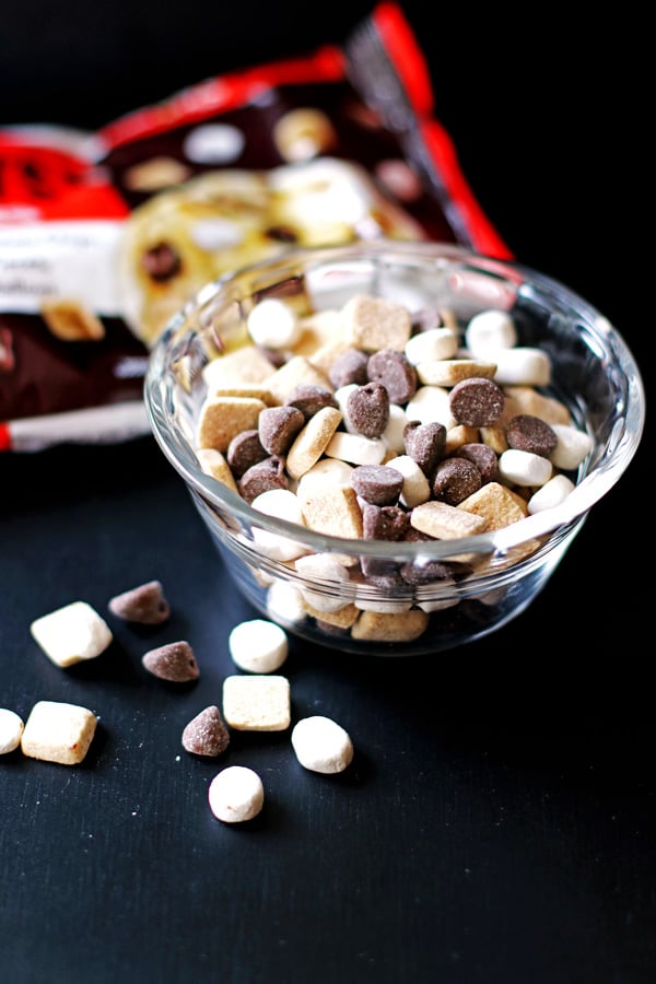 S'mores Cookie mix in a small bowl with the bag next to the bowl