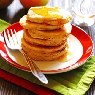 Apple Cinnamon Pancakes on a plate with syrup