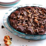 A Chocolate Peanut Butter Cup Pie in a glass baking dish.
