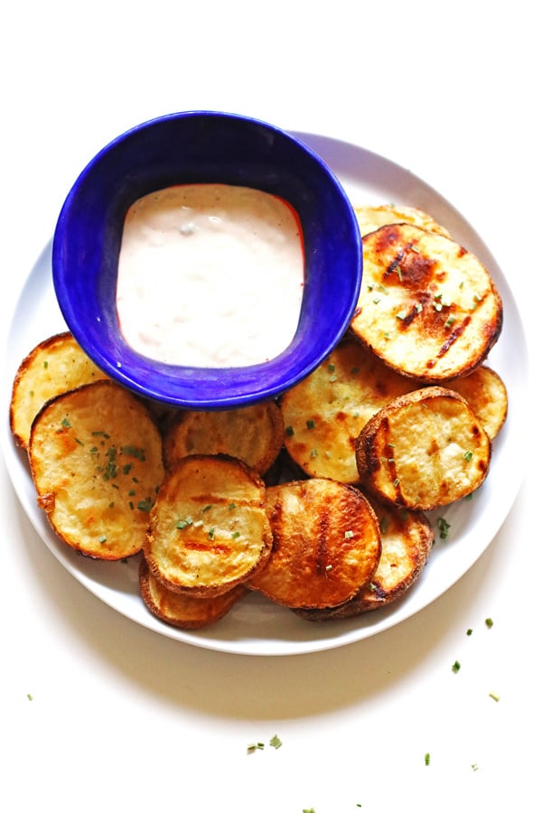 Blue Cheese Grilled Potatoes on a plate with blue cheese dip in a small bowl