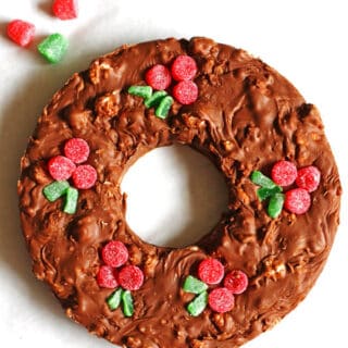 Fudge that is shaped into a Christmas wreath with gumdrops as the berries
