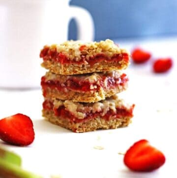 A stack of strawberry rhubarb oatmeal bars.