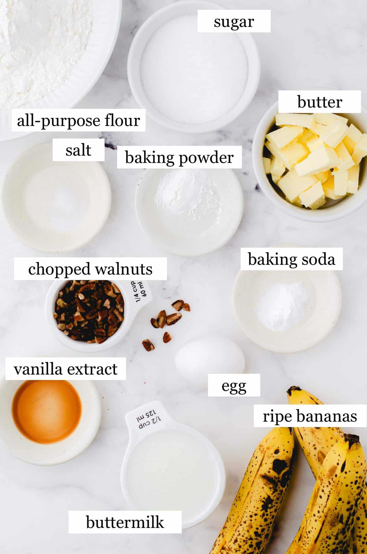The ingredients in buttermilk banana bread laid out and labeled.