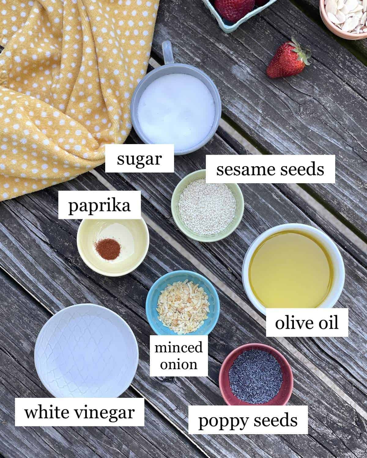 The ingredients in sesame poppyseed dressing, laid out and labeled.