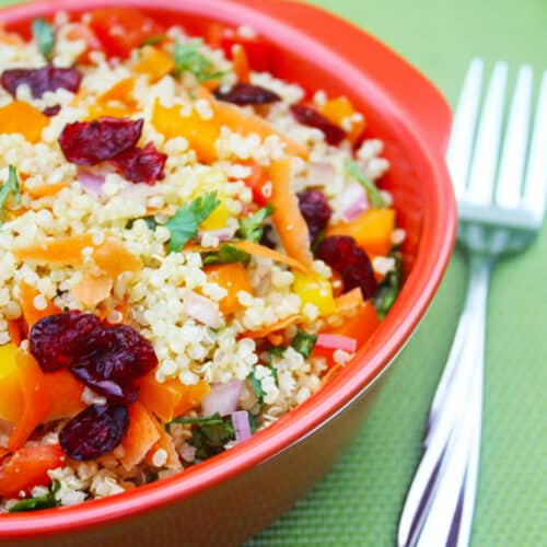 Quinoa veggie salad with carrots, onions, cilantro, and cranberries.