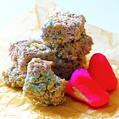 A pile of colorful rice krispie treats made with marshmallow peeps.