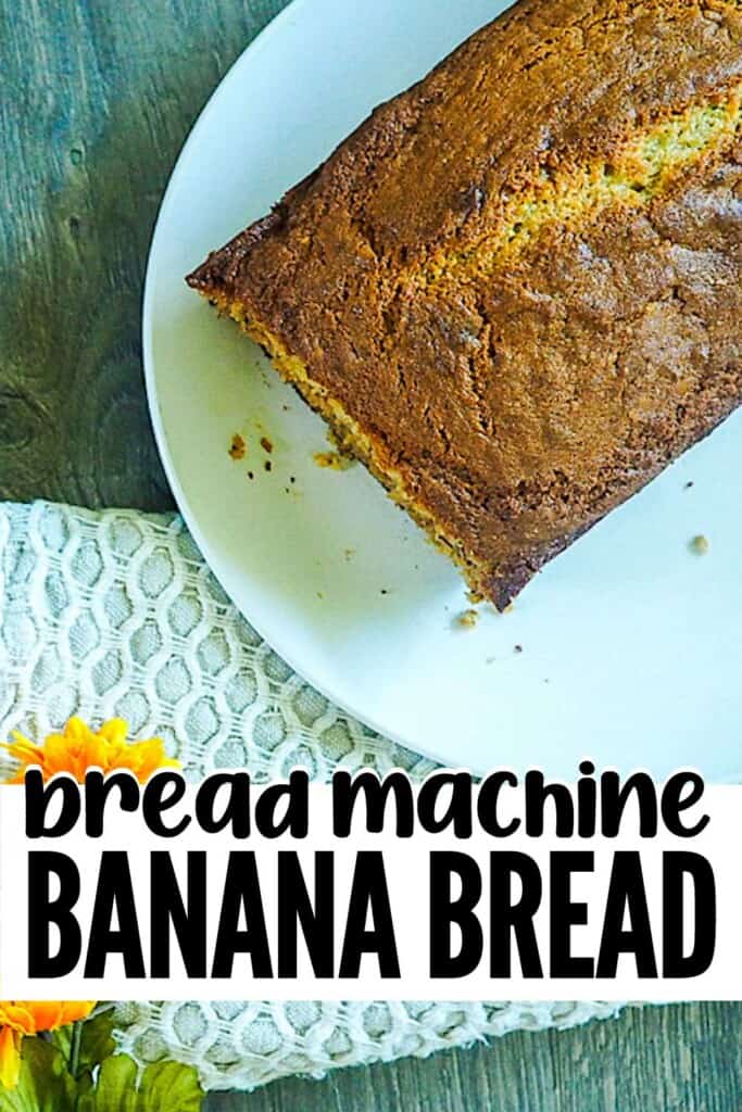 A pin image of a loaf of bread maker banana bread on a white plate with the end cut off.