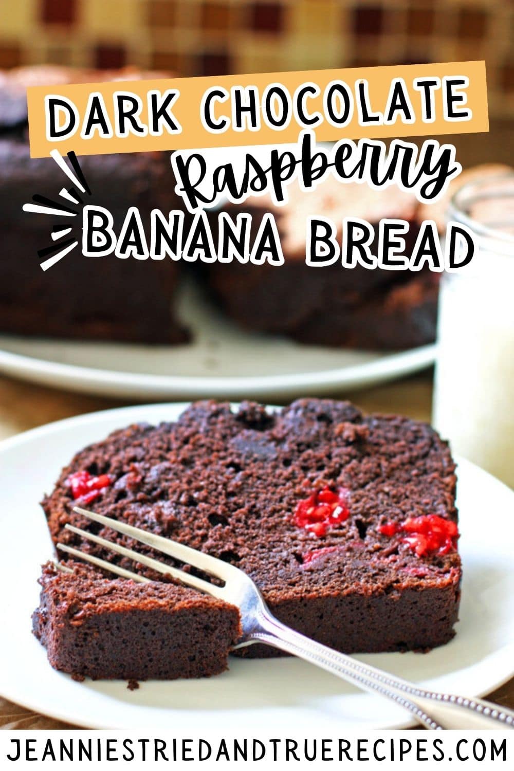 A pin image of a slice of dark chocolate banana bread with raspberries in it.