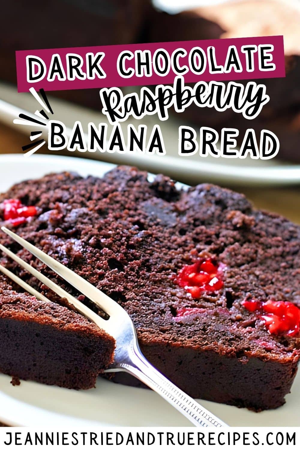 A pin image of a slice of dark chocolate chip raspberry banana bread on a white plate with a fork.